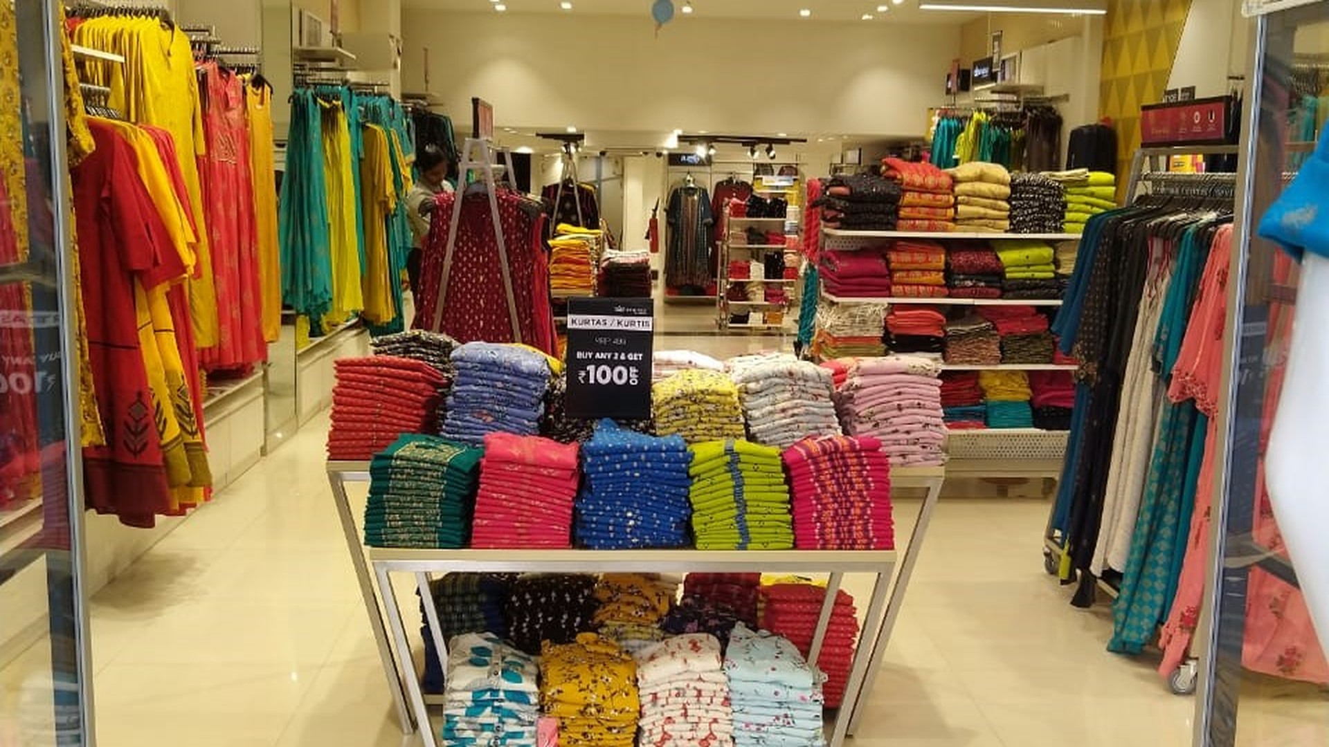 Central Garment Racks & Slatwall Shelving