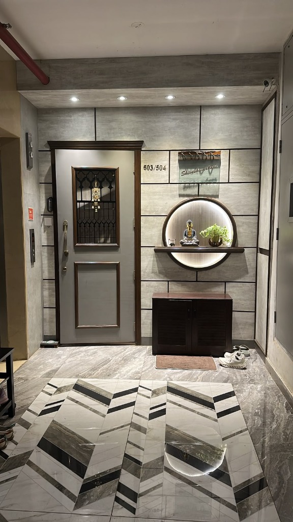 Contemporary Foyer Safety Door with Cornice Architrave & Circular Backlit Niche