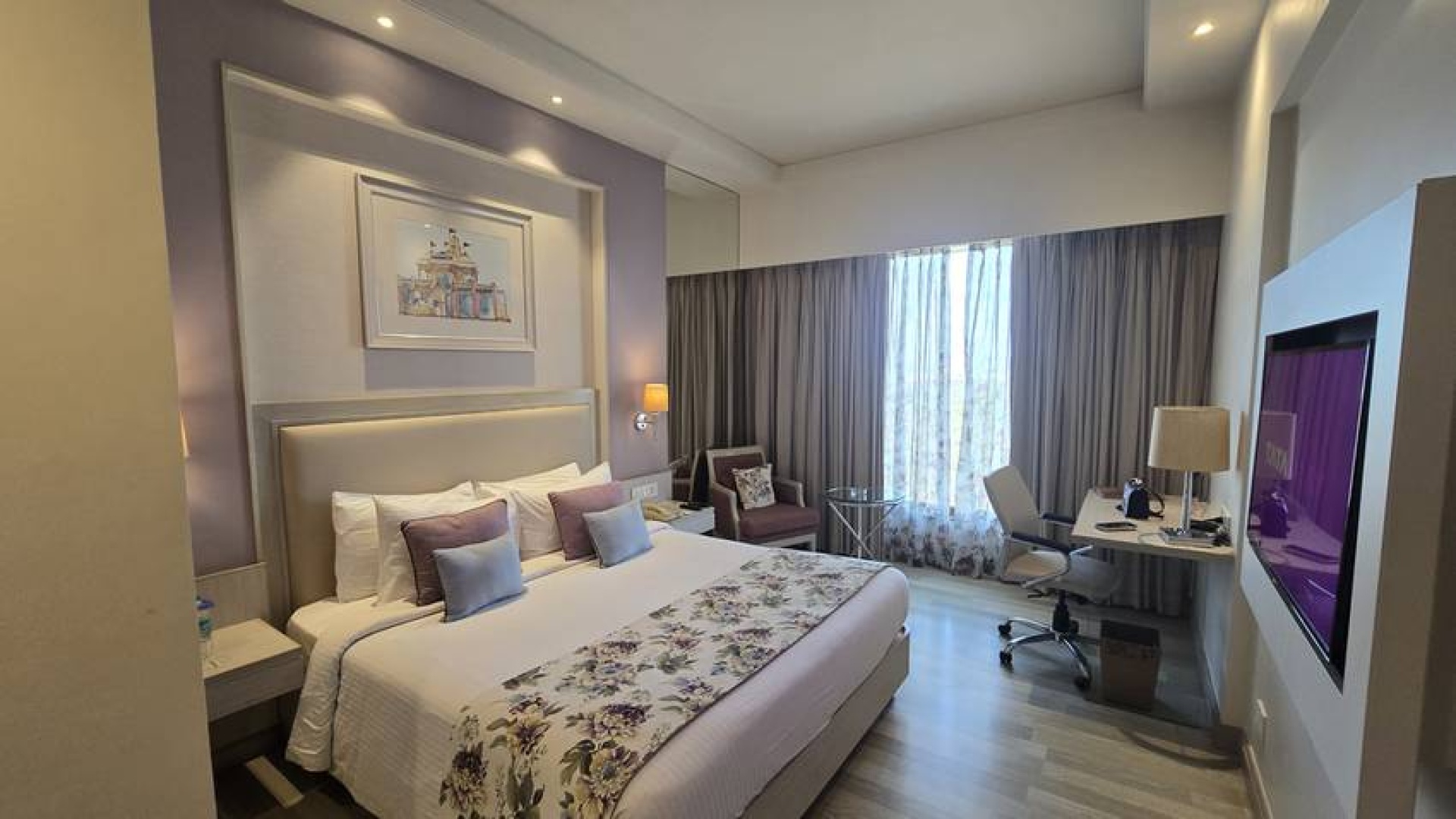 Deluxe King Guest Suite with Upholstered Headboard & Feature Wall