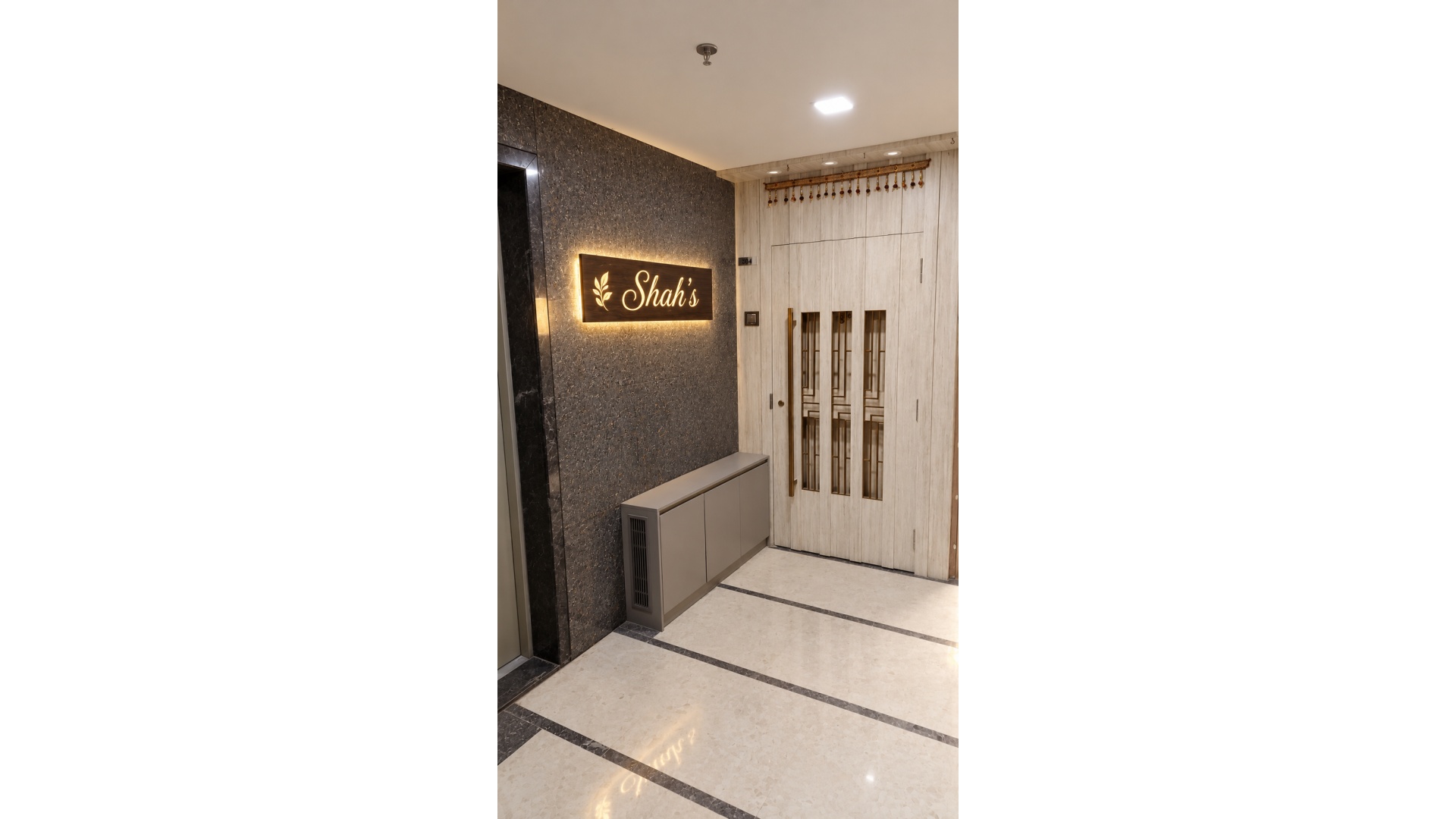 Bespoke Entrance Foyer with Illuminated Nameplate & Louvered Credenza