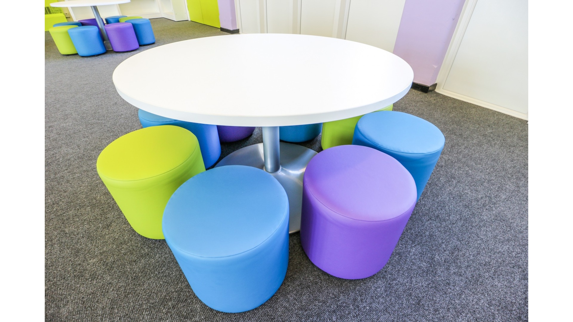 Circular Children's Play Table with Vibrant Cushioned Pouf Stools